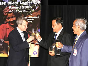 From left to right, Mr. Assaad Jabre, Acting Executive Vice President of IFC, Mr. In Channy, General Manager, and Mr. Chea Sok, Chairman of ACLEDA Bank
