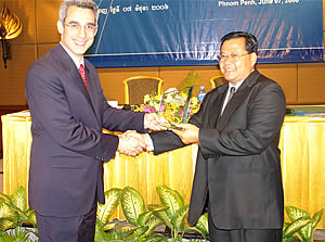 Mr. In Channy, General Manager of ACLEDA Bank receives CGAP Award from Mr. Adam Sack, General Manager of IFC-MPDF