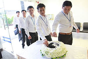 Giving mourning sign to our management and staff